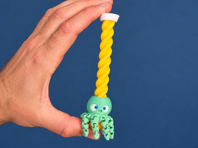 Mini spinning magic octopus wand